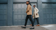 two models walking in the holt boot black and holt boot honey